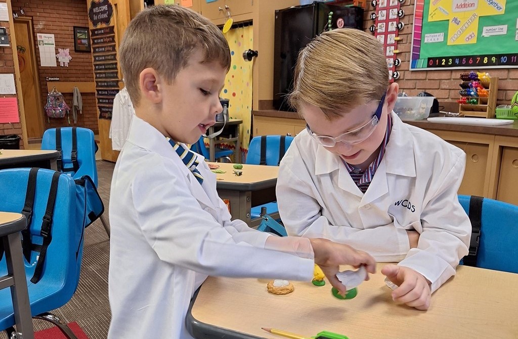 Second grade science buddy with a prek student