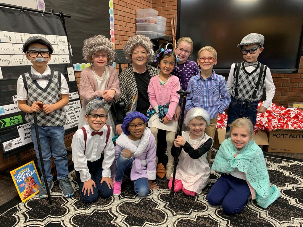Kindergarten dressed up like 100 year olds