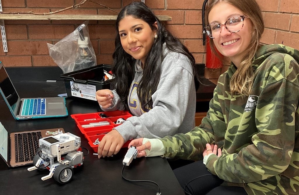 Students working with robots